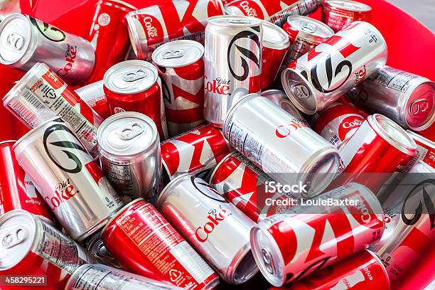 Coke In A Bin Stock Photo - Download Image Now - Aluminum, Brand Name, Can