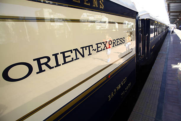 Orient Express train Bucharest, Romania - September 3, 2012: Detail on one of the wagons of the Orient Express train, shortly after arriving in Bucharest. The Venice Simplon-Orient-Express, is a private luxury train service, known as the Orient Express. intercity train photos stock pictures, royalty-free photos & images
