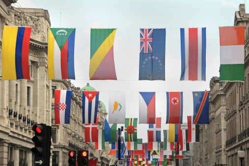 London, United Kingdon - June 22, 2012: International flags hanging on London Regent street before Olympic games 2012