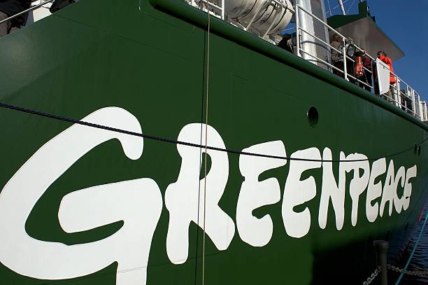 Greenpeace logo on their ship, the Rainbow Warrior III stock photo
