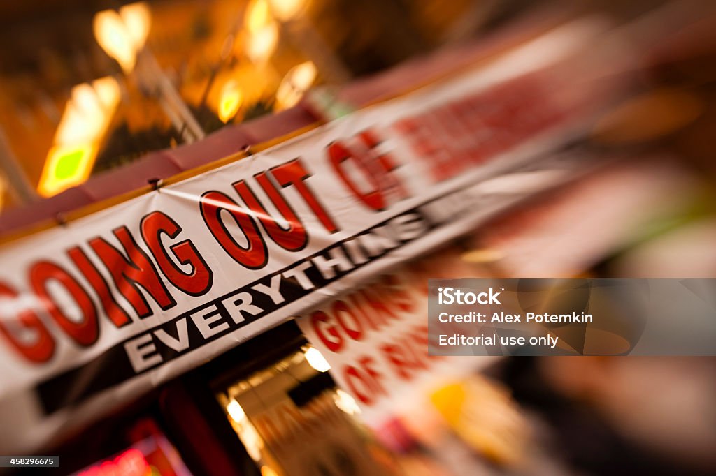 Going out of business New York City, USA - December 28, 2012:  "Goung out of business" posters on the small shop in Manhattan. Blurred Motion Stock Photo