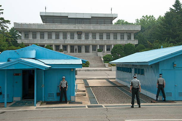 JSA Korea, 24 September 2019 : Border between the North and South Korea at the Joint Security Area or Panmunjom with blue huts and demarcation line in DMZ South Korea