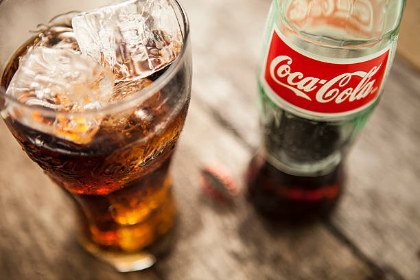 Varna, Bulgaria - July 03, 2023: Classic bottle Of Coca-Cola on white background with frost
