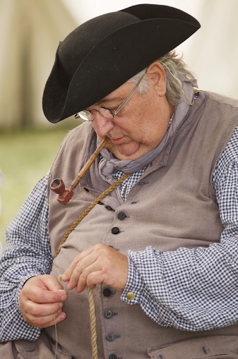 Colonial Rope Maker Colonial Craftsman Making Rope Stock Photo - Download Image Now ...