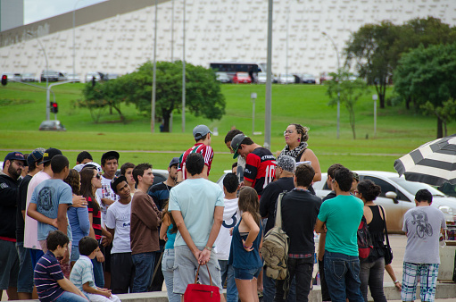 brasilia, brazil - November 10, 2012: The photo shows many youths and adults gathering to view two males perform a battle of words using a reggae format.