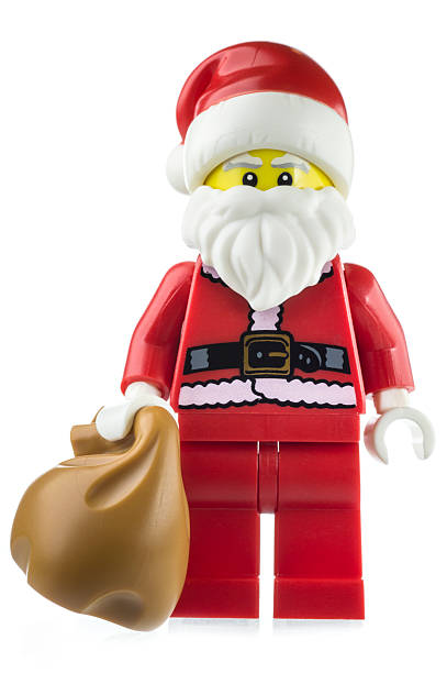santa clause с подарочный пакет lego мини-фигуры - lego toy close up characters стоковые фото и изображения