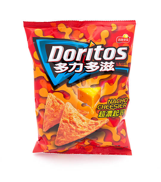 Chinese Nacho Cheese Doritos Taipei, Taiwan - January 8, 2013: This is a studio shot of a traditional Chinese branded bag of Doritos Nacho Cheesier tortilla chips made Frito-Lay isolated on white. Doritos stock pictures, royalty-free photos & images