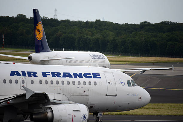 Lufthansa and Air France Jets Taxiing for Takeoff stock photo