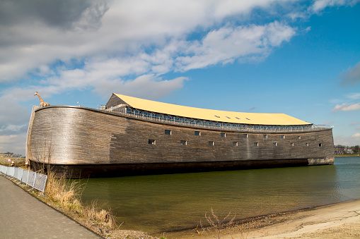 Dordrecht, The Netherlands - March 18, 2013: Just completed full-sized replica of Noah’s Ark docked ready for visitors in Dordrecht. This is John Huibers’, a famous Dutch building contractor, second ark; the first one, a half-sized replica was finished in 2007.