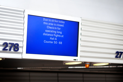 Frankfurt, Germany - April 22, 2013: Ground staff of Lufthansa entered into a one-day token strike. Empty check-in counters at Terminal 1, Airport Frankfurt. Lufthansa is the largest airline in Europe and the world's fifth-largest airline.