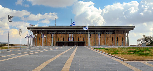 Israel Knesset Jerusalem, Israel - February 25, 2012: The exterior of the parliament of Israel, known as the Knesset. The Knesset passes all laws, elects the President and Prime Minister, and supervises the work of the government. israeli flag photos stock pictures, royalty-free photos & images