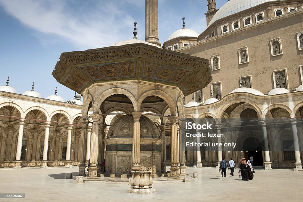 Mosque of Muhammad Ali Cairo, Egypt - May 8, 2013: The Saladin Citadel - the Mosque of Muhammad Ali (Alabaster Mosque), Egypt. Every day many peoples visited the famous mosque as tourists or prayer. Africa Stock Photo