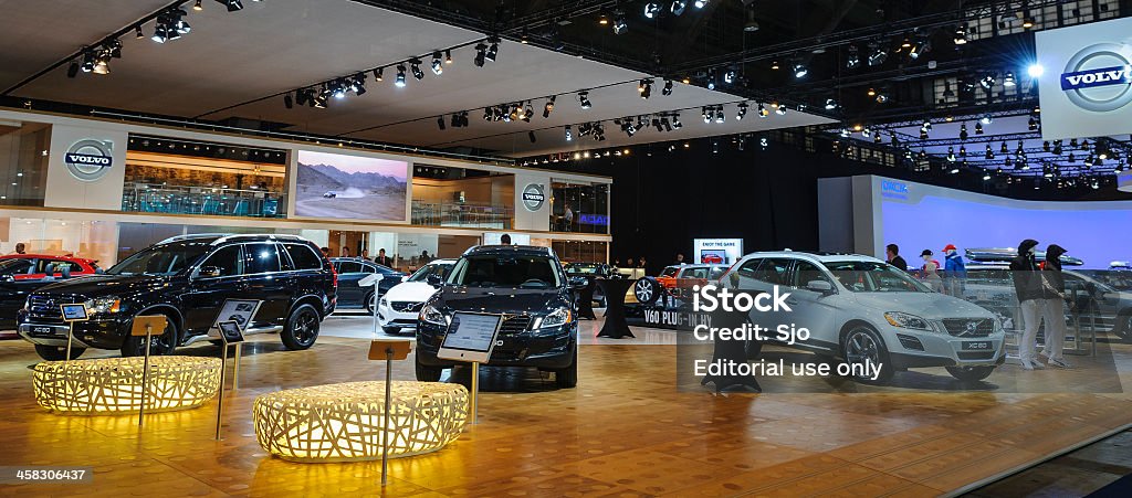 Volvo Brussels, Belgium - January 10, 2012: Volvo car models on display during the 2012 Brussels motor show. People in the background are looking at the cars. 4x4 Stock Photo