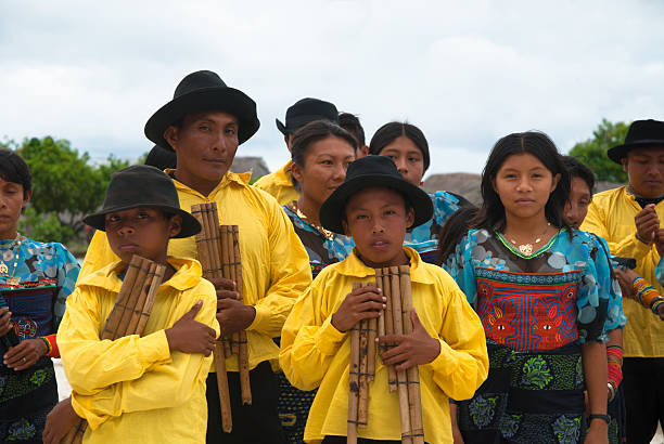 San Blas Islands, Panama - June 4, 2006: Unknown native Kuna Indian men, women and children dressed  in native ceremonial attire in the San Blas Islands, panama.