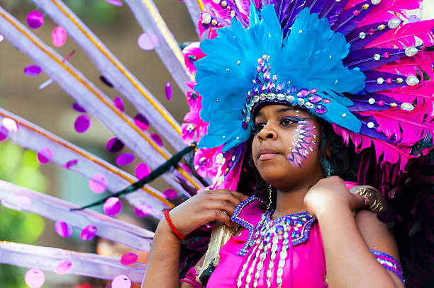 London, UK - August 26, 2012: Performers take part in the first day of Notting Hill Carnival, largest in Europe. Carnival takes place over two days in every August bank holiday.