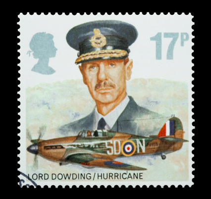 Yateley, Hampshire, UK - September 14, 2012: Mail stamp printed in the UK commemorating the WW2 Hurricane fighter aircraft and RAF leadership of Lord Dowding, circa 1986