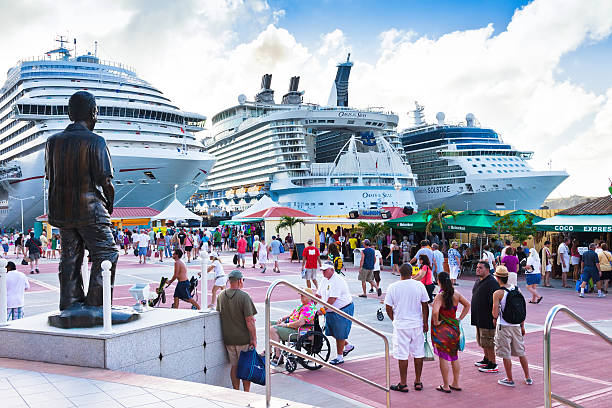 Sydney, Australia - November, 2019; Royal Carribean Cruise Liner, Radiance of the Seas docked at Circular Quay in Sydney. Sydney Opera House in background. This ship boasts floor to ceiling windows and an outdoor cinema playing first run movies.