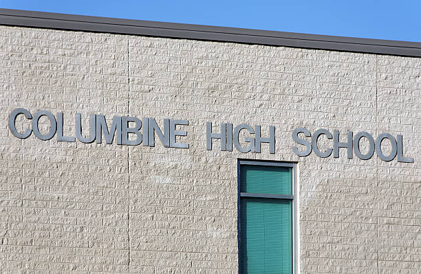 Columbine High School Jefferson County, Colorado, USA aa October 7, 2012: A sign at Columbine High School. Columbine High School was the site of one of the worst school shootings in United States history on April 20, 1999. columbine stock pictures, royalty-free photos & images