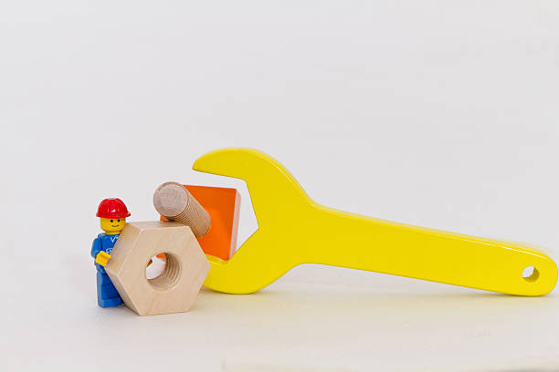 mechaniker arbeiten - lego construction toy isolated on white isoalted stock-fotos und bilder