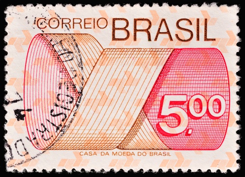 Stockholm, Sweden - February 11, 2013: BRAZIL - CIRCA 1972: A stamp printed in Brazil have background of multiple Push-to-talk symbols, circa 1972.