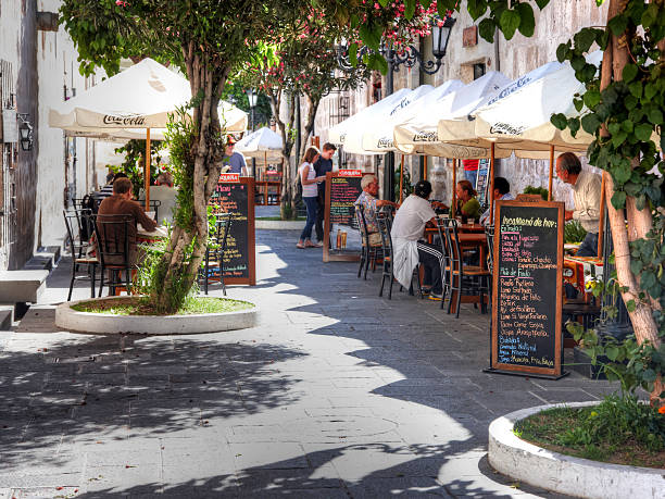 A roadside cafe table overlooking the Mediterranean