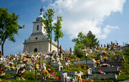 Zubrzyca Gorna, Poland - August 23, 2013:Small  chapel and the cemetery on the hill  in the village Zubrzyca Gorna, Malopolskie province, Poland