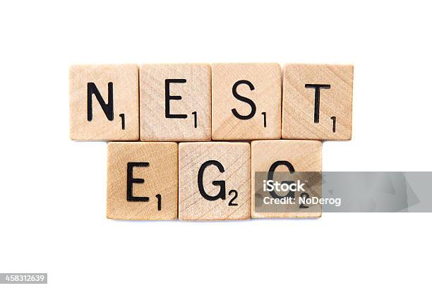 Nest Egg Spelled In Scrabble Letter Tiles Stock Photo - Download Image Now - Alphabet, Block Shape, Business