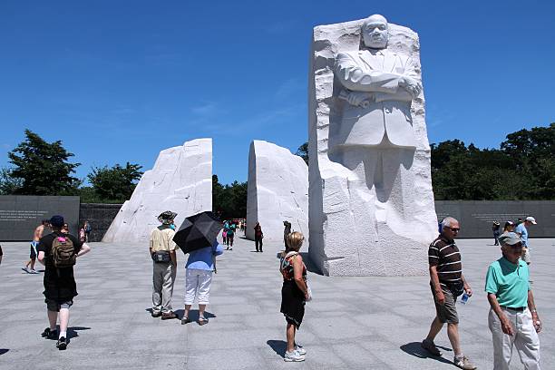 Martin Luther King Washington, United States - June 15, 2013: People visit Martin Luther King memorial on June 15, 2013 in Washington. 18.9 million tourists visited capital of the United States in 2012. martin luther king jr memorial stock pictures, royalty-free photos & images