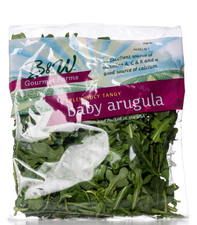 Miami, USA - May 27, 2013: B&W Gourmet Farms Splendily Tangy Baby Arugula salad bag. B&W brand is owned by B&W Quality Growers, Inc.
