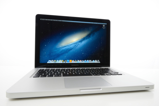 Astanbul, Turkey - September 16, 2012: MacbookPro displaying desktop. Macbook is a laptop computer, produced by Apple Inc.