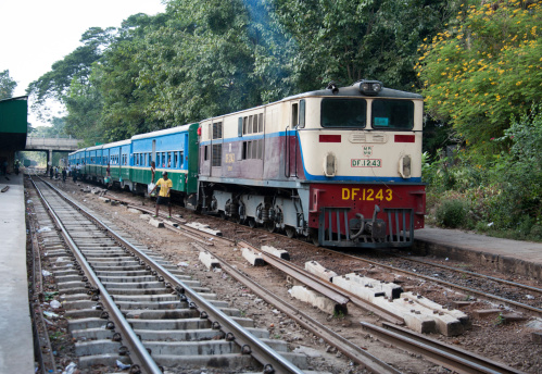 Pune, India - October 22 2023: Passenger train hauled by a WAP7 electric locomotive near Pune India.