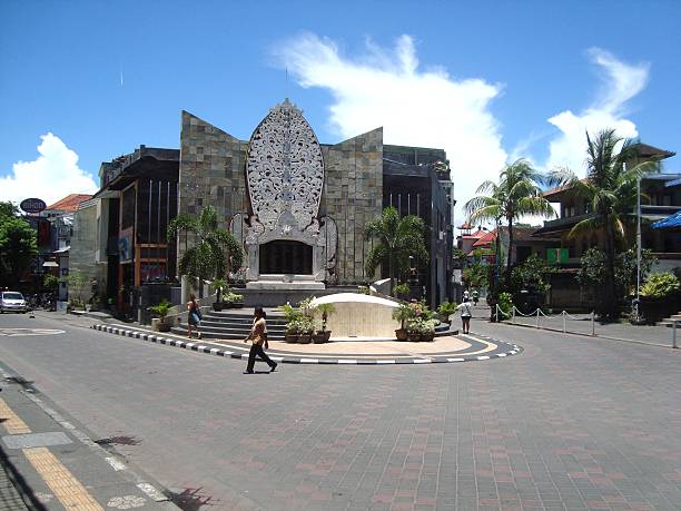 Bali bombing memorial, Kuta - Indonesia Kuta, indonesia - February 20, 2009: Bali bombing memorial. It was dedicated on 12 October 2004, the second anniversary of the terrorist attack, were 202 people were killed. Locals walking on Legian street in front of the memorial. kuta beach stock pictures, royalty-free photos & images