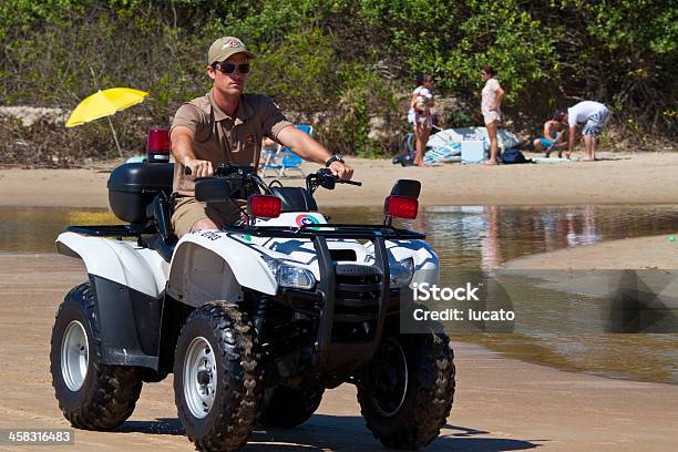 Beach Patrolling On Quadbike Stock Photo - Download Image Now - Beach, Florianópolis, Police Force