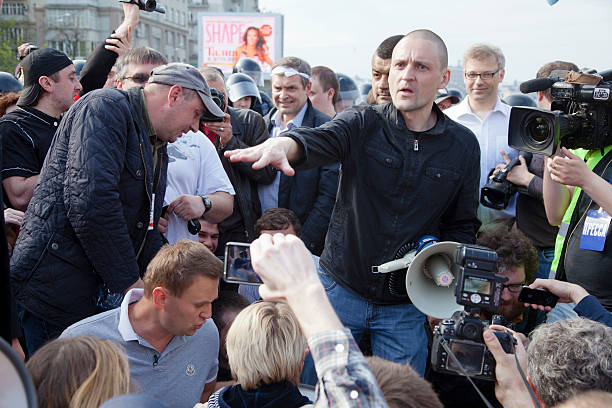 Moscow, Russia - May 6 2012: Russian opposition leader Sergey Udaltsov at march of millions protest through Moscow. March of millions protest Vladimir Putin's government in Moscow.