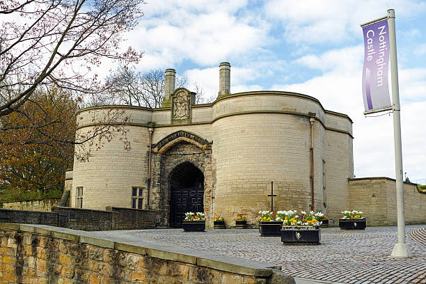 Nottingham, United Kingdom - July 17, 2014: View of the castle on top of the castle mound caves in castle rock, Nottingham, Nottinghamshire, England, UK, Western Europe.