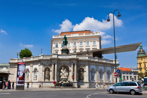 Vienna, Austria - June 19, 2013: Albertina Museum on a beautiful summer day. It houses one of the largest and most important collection of drawings, as well as more modern graphic works, photographs and architectural drawings. Tourists are walking around.