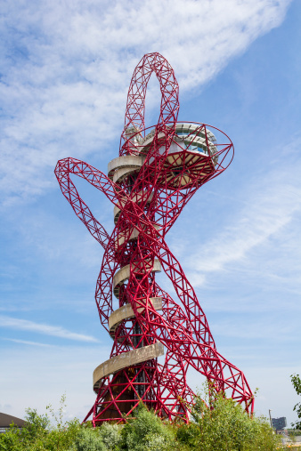 London, UK - July 27, 2013: The ArcelorMittal Orbit at the Queen Elizabeth Olympic Park in Stratford, London. This structure is 114.5 metres high and allows visitors to view the whole Olympic Park from observation platforms.