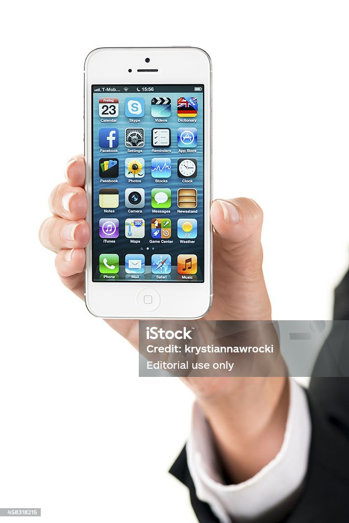 Mani tenendo iPhone 5 - Foto stock royalty-free di Abbigliamento formale