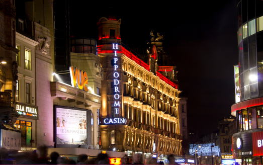 London, UK - January 1, 2013: Hippodrome Casino and other neon advertisements in Leicester Square in London, UK on January 1, 2013