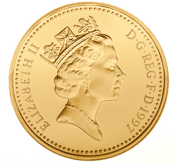 British One Pound Coin (with Clipping Path) Brighton, UK - April 6, 2013: British one pound coin produced by the Royal Mint, UK. Photographed in the studio and isolated on white with clipping-path. elizabeth ii photos stock pictures, royalty-free photos & images