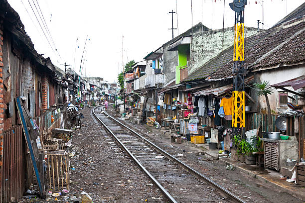 unidentified poor people living in slum, indonesia. - malang stok fotoğraflar ve resimler