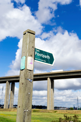 Ipswich, England - August 30, 2013: A footpath sign near the Orwell Bridge at Wherstead, just outside Ipswich, in Suffolk, England, on a sunny August day.