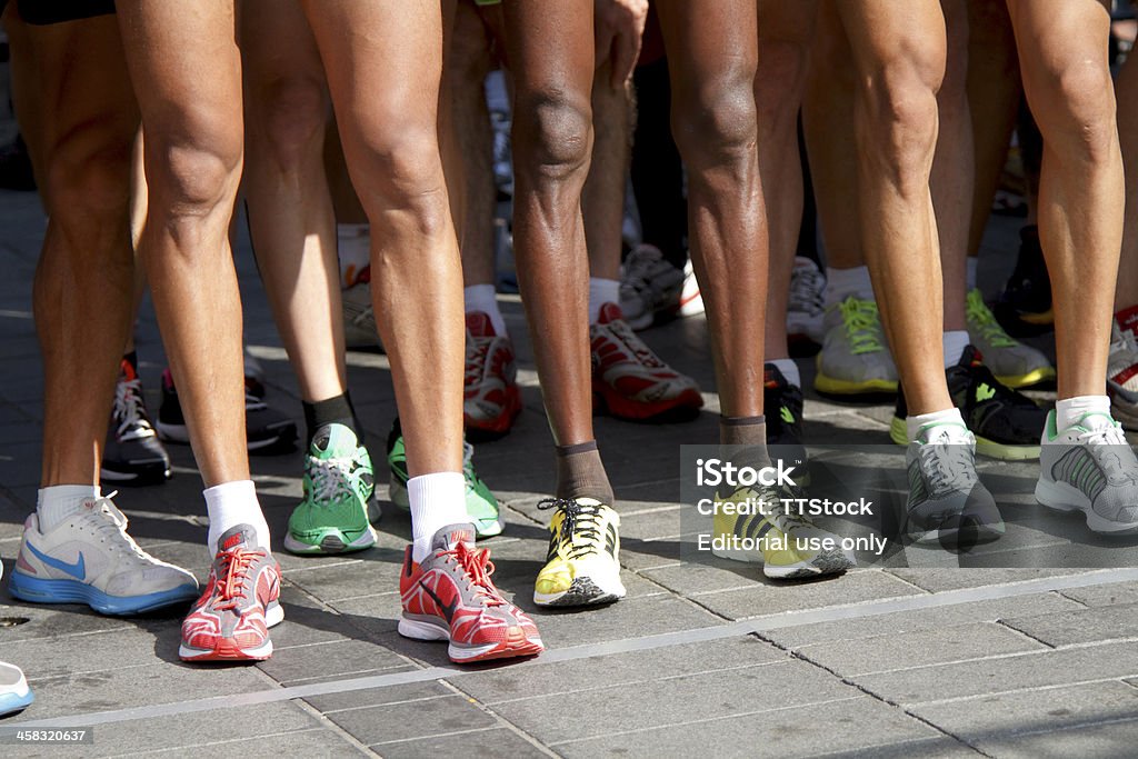 Runners stand on the line Dordrecht, Netherlands - September 25 2011: Runners stand on the line at the start of the Drechtstedenloop in Dordrecht. The race is a 10km and 5km street circuit for all ages. Active Lifestyle Stock Photo