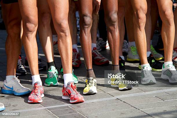 Runners Stand On The Line Stock Photo - Download Image Now - Active Lifestyle, Activity, Adult