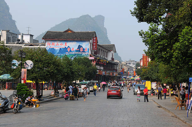 Yangshuo, China - October 11, 2012: in the afternoon, the West Street (Xi Jie, AYAA!a), located at the center of YangShou, is always crowded with tourists.