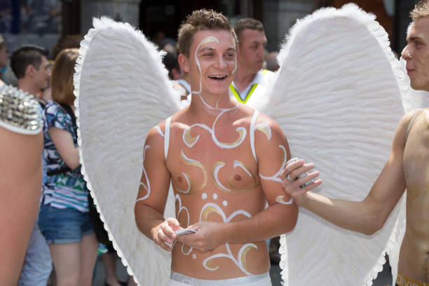 Munich, Germany - July 13, 2013: Participants of the Christopher Street Day procession through the inner city of Munich. Christopher Street Day is a celebration and demonstration for the rights of lesbians and gays held each year in different European cities. It is similar to the Gay Pride parades.