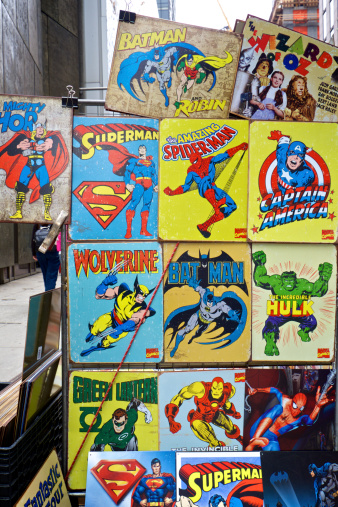 New York, United States - April 20, 2013:  Stand with superheroes merchandising products on the streets of New York.