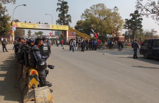 Kathmandu, Nepal - March 5, 2013: Police Maoist standoff during general strike