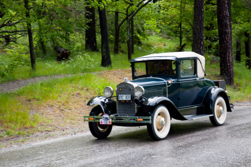 Stockholm, Sweden - June 03,2012: A fully restored Ford A from 1930, in a classic car cavalcade around the small island DjurgAYrden on the public road in Stockholm Sweden