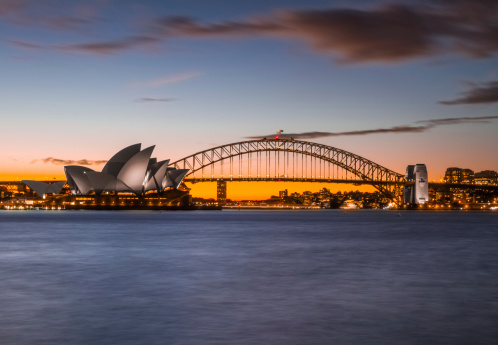 Sydney, Australia - April 10, 2012: Twilight shot of Sydney Opera House and Sydney Harbour Bridge, from \